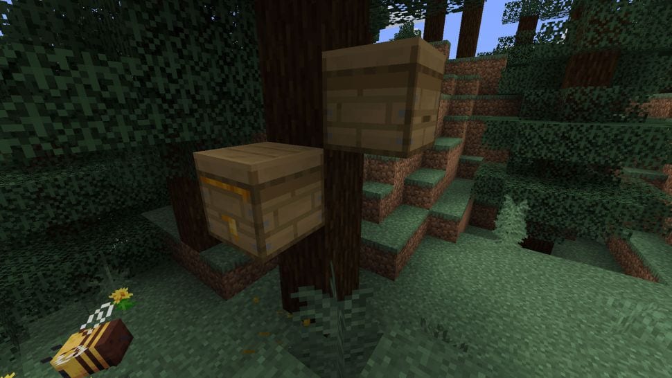 dos colmenas en un árbol en Minecraft