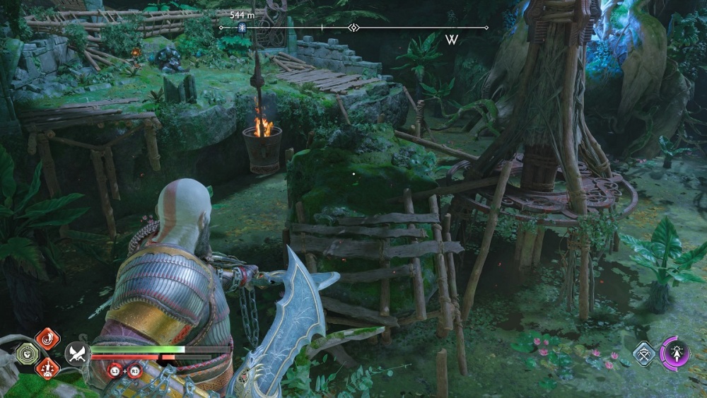 Quema la zarza para liberar el cubo de fuego en el puente de la aldea abandonada en God of War Ragnarok