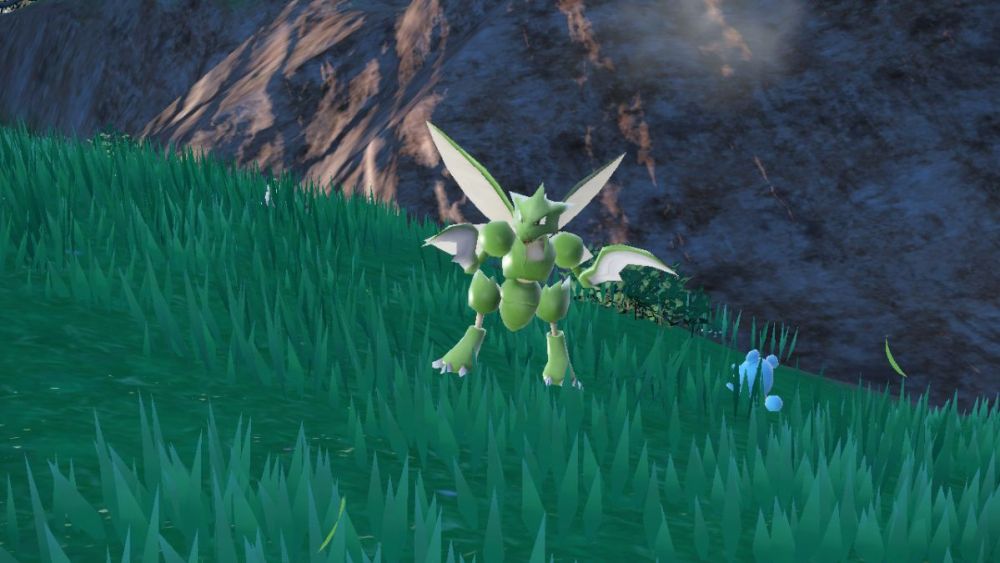 Un Scyther Pokémon escarlata y violeta salvaje 