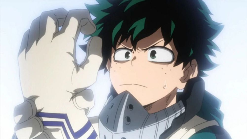 Deku con una mirada seria y concentrada en su rostro.