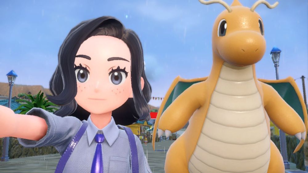 Selfie de Pokemon Scarlet y Violet con entrenador y Dragonite