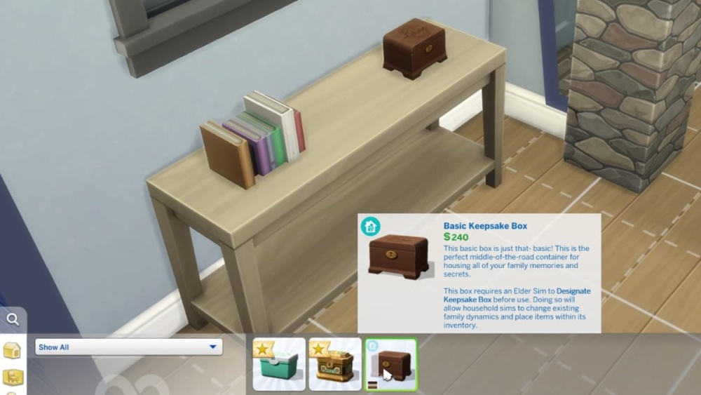 Tres cajas de recuerdos en el modo Construir de Los Sims 4.