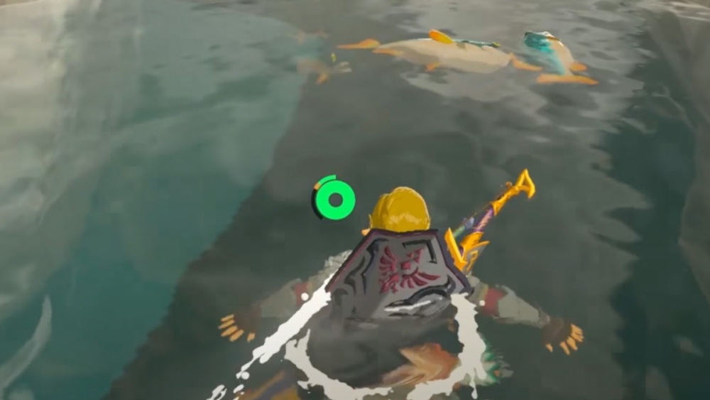 Link nadando hacia Hearty Bass en Zelda: BOTW