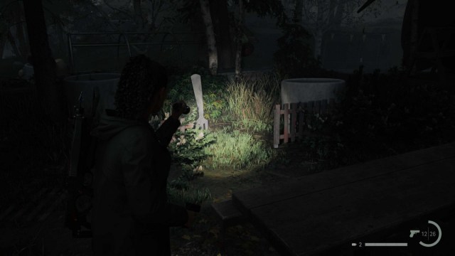 El escondite de culto de Coffee World Well en Alan Wake 2 Fence