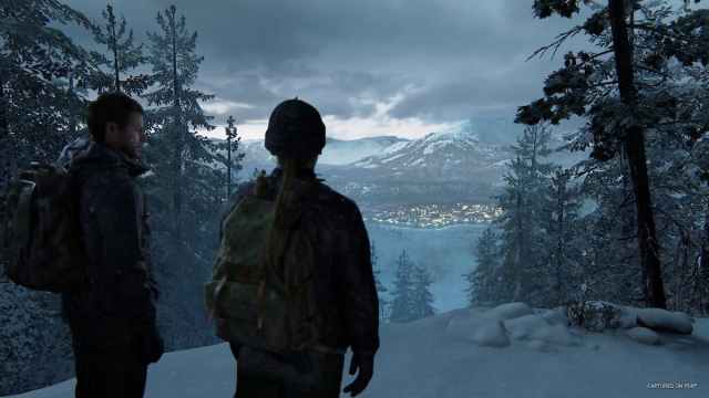 Los personajes de The Last of Us Part 2, Abby y Owen, contemplan un Jackson nevado, Wyoming.